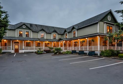 a large building with a parking lot in front of it at Wild Iris Inn in La Conner