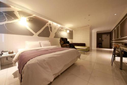 Katil atau katil-katil dalam bilik di Gram Hotel