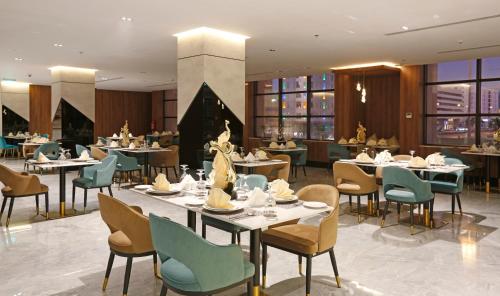 Restoran atau tempat lain untuk makan di Novo Hotel