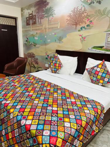 Una cama o camas en una habitación de The Manthan Stays