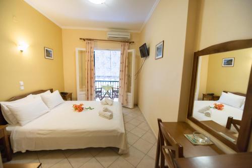 Кровать или кровати в номере Sofia Hotel