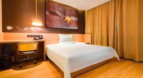 Postel nebo postele na pokoji v ubytování IU Hotels·Tongling Beidouxingcheng