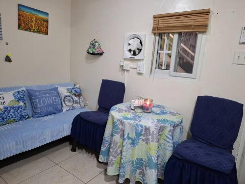 Coin salon dans l'établissement Swette Love 10 minutes from the airport Tocumen