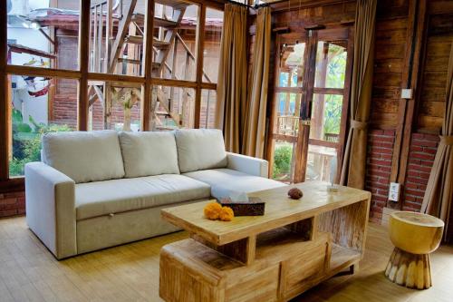 Zona de estar de Alain villas Family and groups
