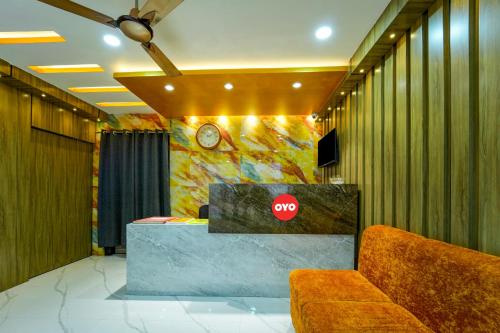 a lobby with a stop sign on the wall at HOTEL O BHAGMATI GARDEN GUEST HOUSE in Dhanbād