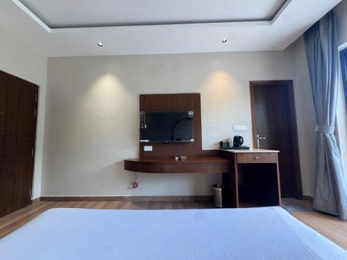 Ein Bett oder Betten in einem Zimmer der Unterkunft Saraiville- A Boutique Riverside Resort