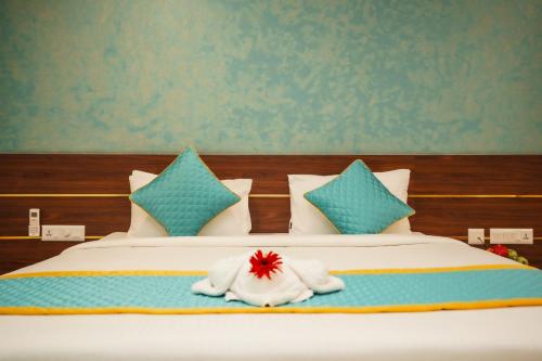 Postel nebo postele na pokoji v ubytování Santrina Hotels