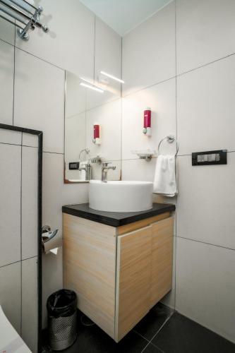 Kuchyň nebo kuchyňský kout v ubytování Santrina Hotels