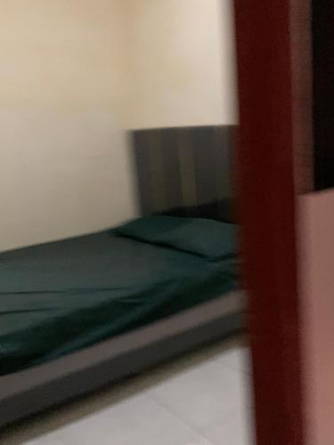 Una cama o camas en una habitación de soft homestay
