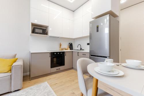 Dapur atau dapur kecil di Апартаменты в минималистическом стиле