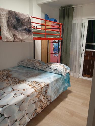 En eller flere senge i et værelse på Perla del Mar 2 con ascensor