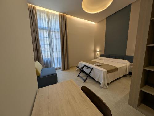Ένα ή περισσότερα κρεβάτια σε δωμάτιο στο Hotel San Lorenzo Catedral