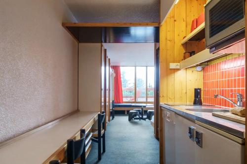 Dapur atau dapur kecil di Arc 1600 - 2 pièces ouvert, 4 personnes, signé Charlotte Perriand