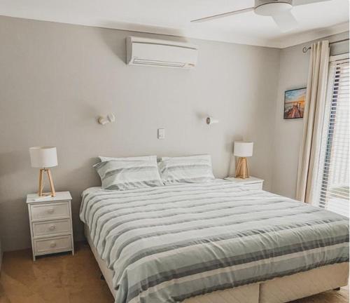 Ένα ή περισσότερα κρεβάτια σε δωμάτιο στο Salt and Sand Escape