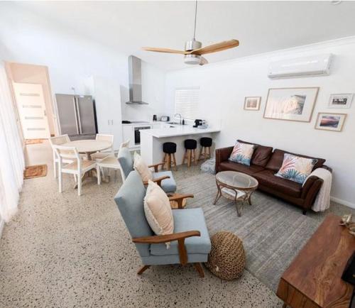 a living room with a couch and a table at Sou Wester in Lancelin