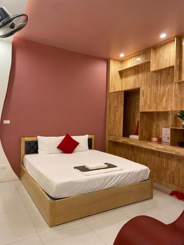 Ένα ή περισσότερα κρεβάτια σε δωμάτιο στο Habibi Hotel