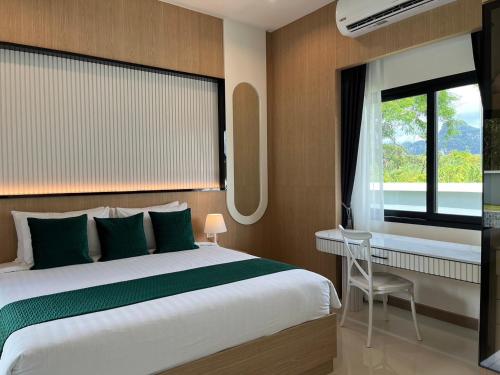 Ένα ή περισσότερα κρεβάτια σε δωμάτιο στο Leigh Villa