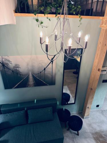 Coin salon dans l'établissement Apartament Przystań
