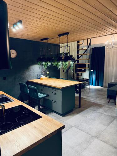 Coin salon dans l'établissement Apartament Przystań
