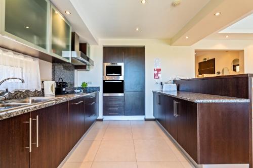 Dapur atau dapur kecil di Paradise on the Golf