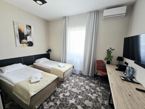 Postel nebo postele na pokoji v ubytování Hotel Picaro Żarska Wieś Północ A4 kierunek Niemcy