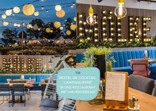 a restaurant with a sign in front of it with lights at River Cabin with bubbeltub 6 people in Zuna