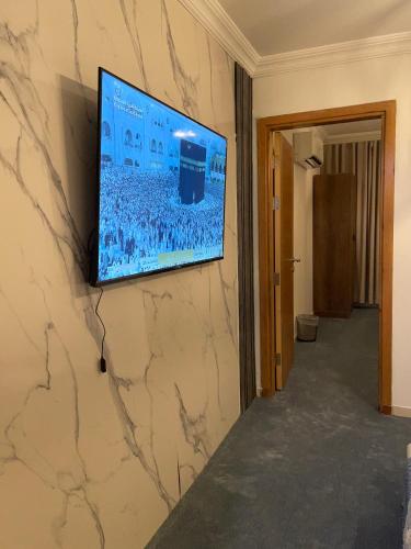 أبراج التلالにあるテレビまたはエンターテインメントセンター