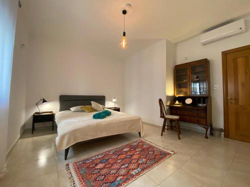 Ένα ή περισσότερα κρεβάτια σε δωμάτιο στο Elegant Sea View 3 bed 2 bath apartment in Sliema with parking