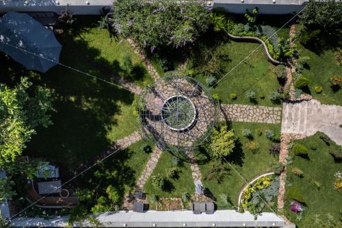 an overhead view of a garden with a circle at REDROOF country house hotel in Goris