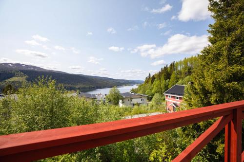 a view of a river from a wooden bridge at Åre Travel - Lilla Årebo in Åre