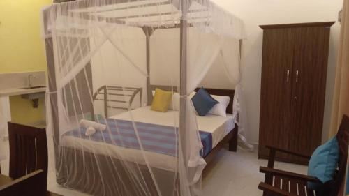 Postel nebo postele na pokoji v ubytování Villa 307A