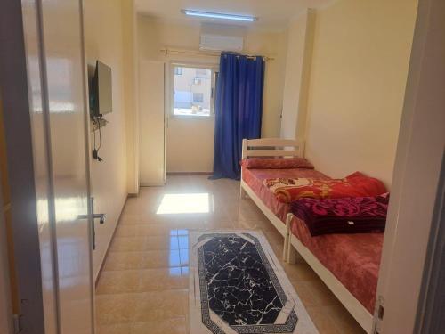 Ένα ή περισσότερα κρεβάτια σε δωμάτιο στο Sweet Home 8