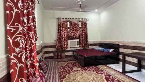 Posezení v ubytování Gaurika Farmhouse