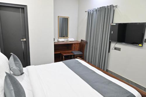 TV a/nebo společenská místnost v ubytování Hotel Devaan