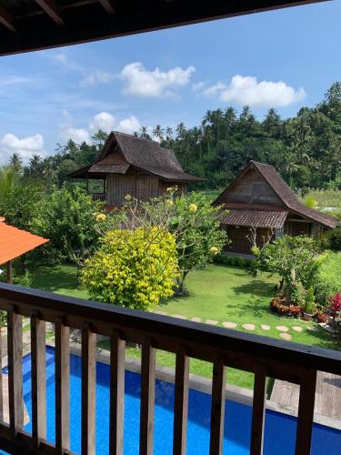 a view from the balcony of a resort at Kubu Sakian Villa and Restaurant Sidemen in Silebeng