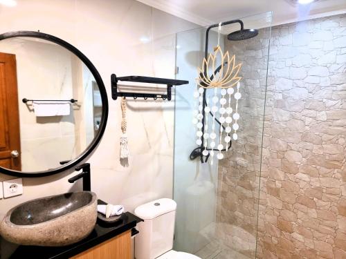 Koupelna v ubytování Mana Suites Bali