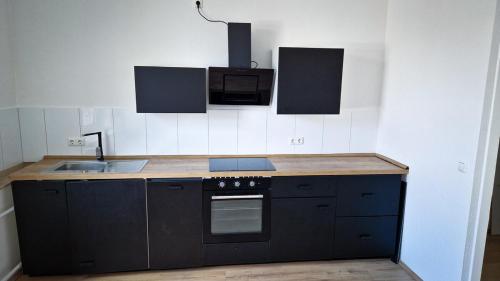 Una cocina o zona de cocina en 2-room apartment only 14 minutes to Düsseldorf main station