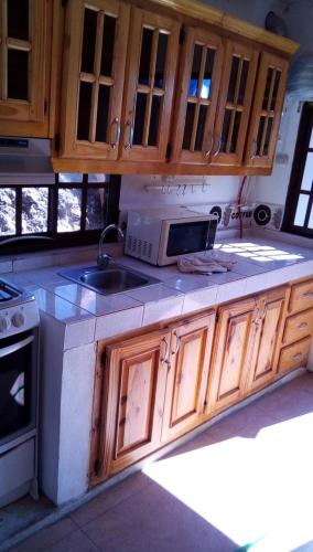 Η κουζίνα ή μικρή κουζίνα στο Villa Azul - Incredible views