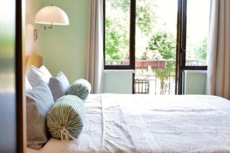 Ένα ή περισσότερα κρεβάτια σε δωμάτιο στο Villa Meier