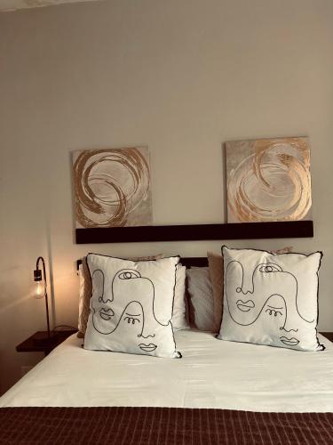 Ένα ή περισσότερα κρεβάτια σε δωμάτιο στο Pink Lopez Guest House