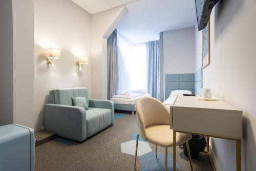 TV a/nebo společenská místnost v ubytování Moon ApartHotel