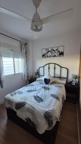 Ένα ή περισσότερα κρεβάτια σε δωμάτιο στο Apartamento Colegueo