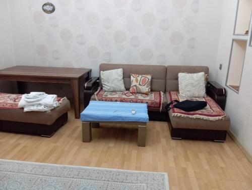 Posezení v ubytování Khan Apartment