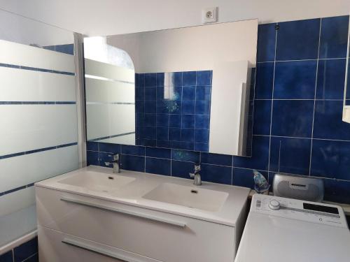a bathroom with a sink and a mirror at Holiday Home Ste Claire by Interhome in Solliès-Pont