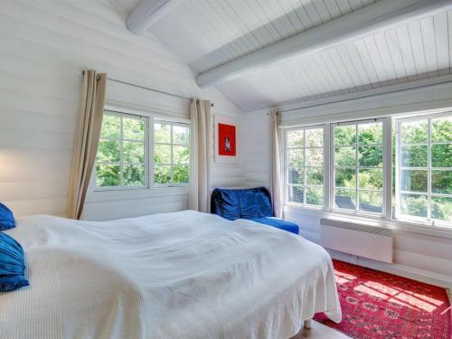 Katil atau katil-katil dalam bilik di Holiday Home Ottil - 1km from the sea by Interhome