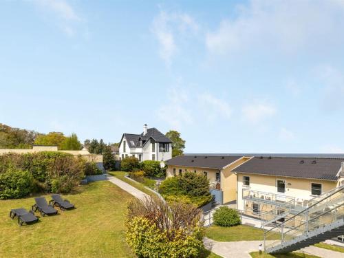 an aerial view of a house with a yard at Apartment Hermann - 100m from the sea by Interhome in Allinge