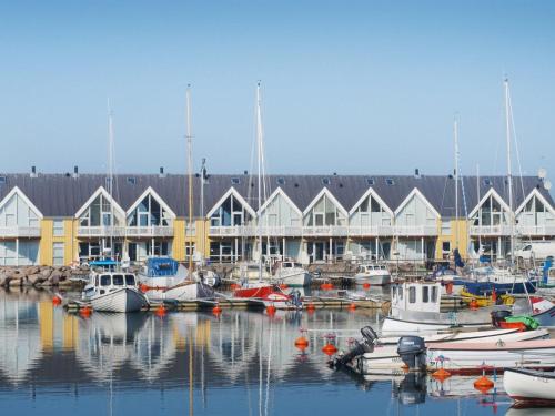 a group of boats are docked in a marina at Holiday Home Frigg - 10m from the sea by Interhome in Hasle