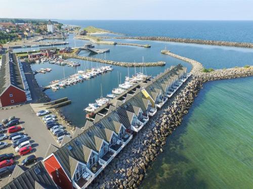 an aerial view of a marina with boats in the water at Holiday Home Eija - 5m from the sea by Interhome in Hasle