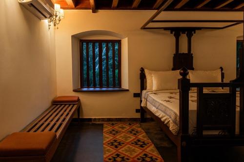 Seclude Karthika Nivas, Thrissurにあるベッド