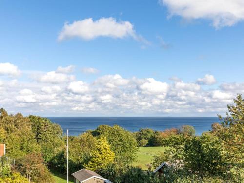 a view of the ocean from a house at Holiday Home Tjelle - 300m from the sea by Interhome in Allinge